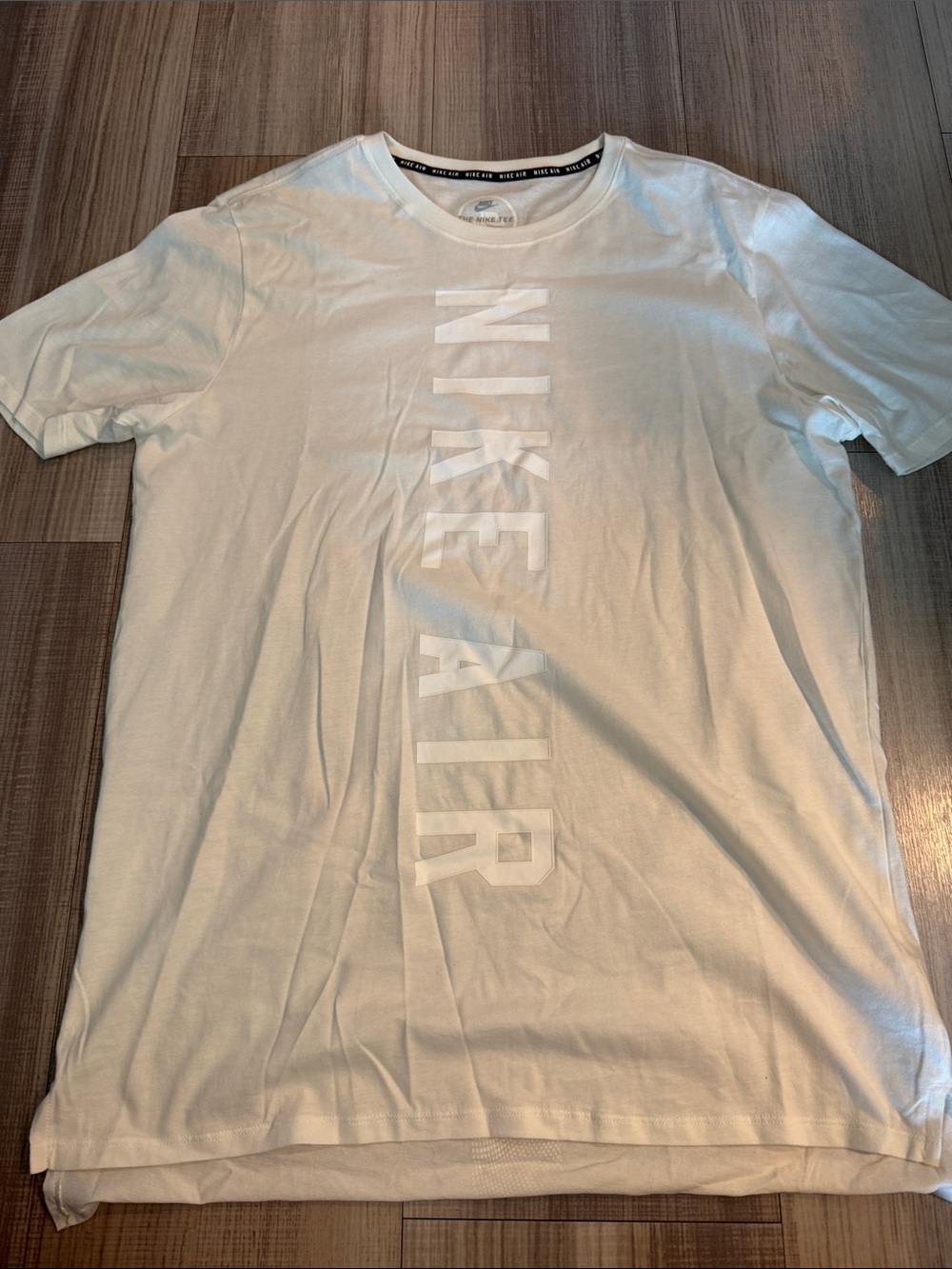 Nike White Short Sleeve Tee with Vertical 'Nike Air' Logo